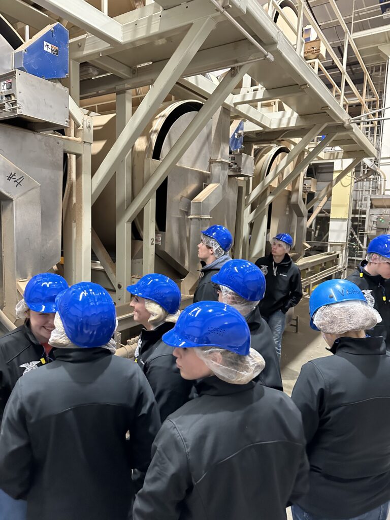 Oregon FFA members are pictured in a Nichols Farms pistachio processing facility.